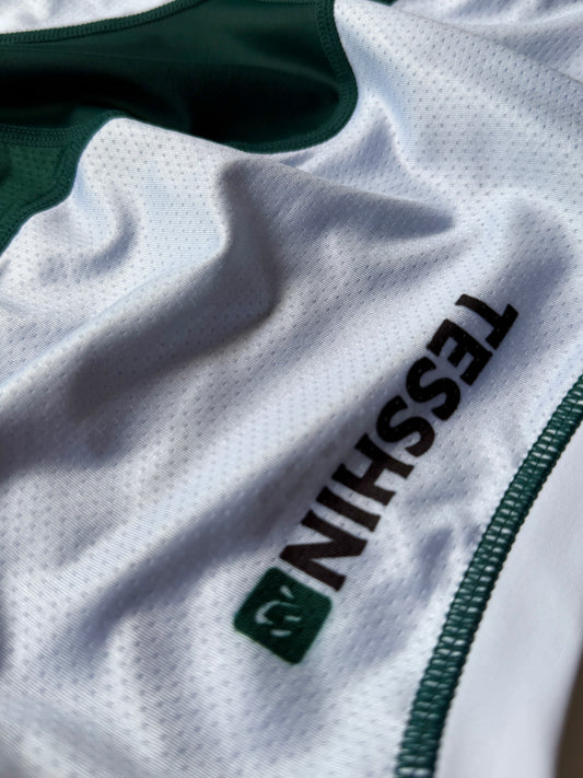 Close-up of upper back mesh panel on Tesshin Jade Green rash guard