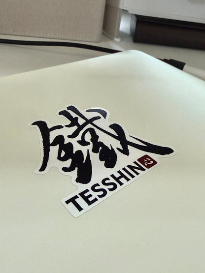 Tesshin BJJ logo sticker on laptop