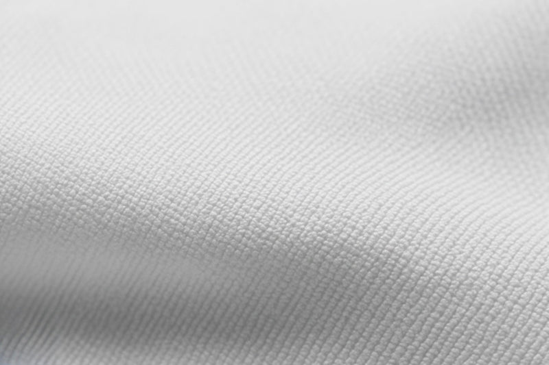 Close-up of fabric on Tesshin white rash guard