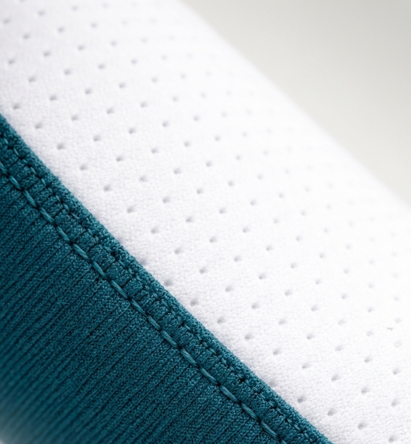 Close-up of shoulder mesh on Tesshin blue rash guard