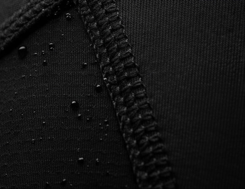 Close-up of stitching on Tesshin black rash guard