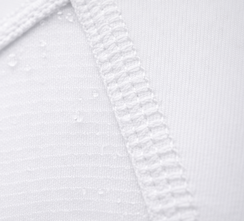 Close-up of stitching on Tesshin white rash guard